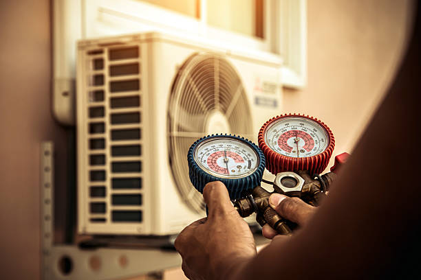 Professional Air Conditioning Service technician working in Morgan, PA